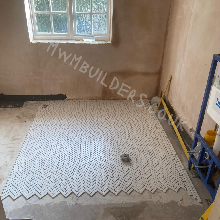 Bathroom Installers Tiled shower base, wet rooms and bathrooms in Maidenhead Windsor Marlow Builders.